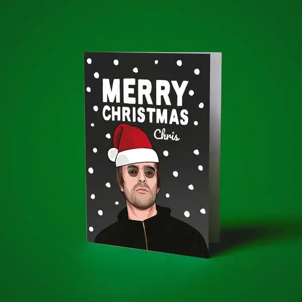 Personalised Christmas greeting card featuring an illustrated character in a Santa hat against a snowy black background.